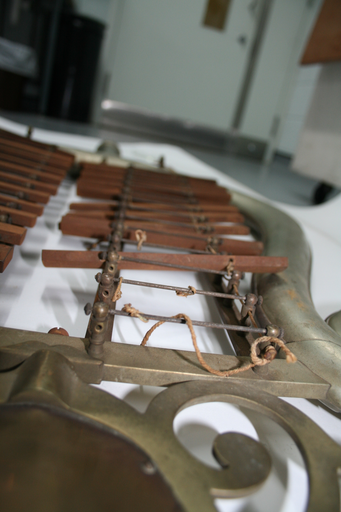 Loose, rusted chime bars and missing cat gut string