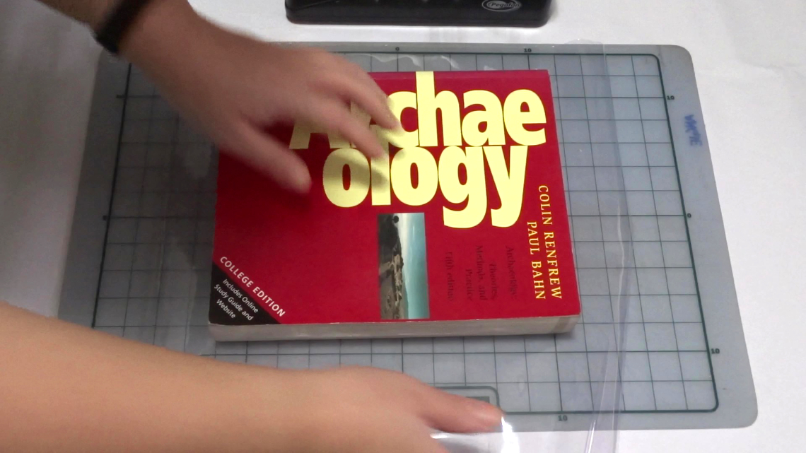 Book over plastic wrap