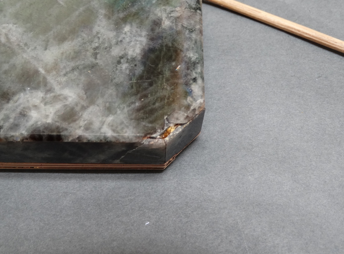 Damaged corner before conservation